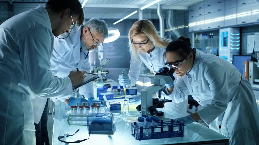 Team,Of,Medical,Research,Scientists,Collectively,Working,On,A,New