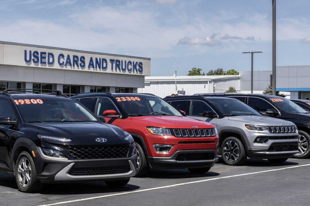Used car display at a dealership. With pricing issues, used and preowned cars are in high demand.